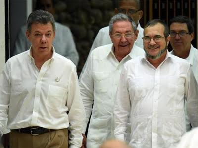 juan_manuel_santos_raul_castro_y_timochenko_foto_afp_1