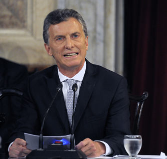 Argentine President-elect Mauricio Macri (L) speaks beside Vice president-elect Marta Gabriela Michetti during their inauguration ceremony at the Congress in Buenos Aires on December 10, 2015. Macri's inauguration marks the start of a new era for Argentina: a tilt to the right after 12 years under Kirchner and her late husband Nestor, the left-wing power couple that led the country back to stability after an economic meltdown in 2001.  AFP PHOTO/ALEJANDRO PAGNI / AFP / ALEJANDRO PAGNI