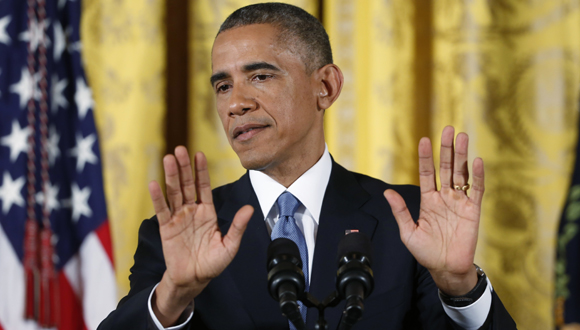 President Obama answers questions during a news conference in the East Room of the White House, one day after Republicans seized control of the U.S. Senate and captured their biggest majority in the House in more than 60 years.