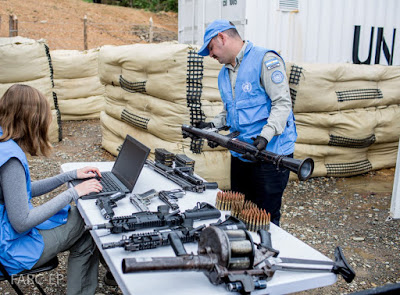 ENTREGA-ARMAS-FARC-EP-COLOMBIA-PAZ-SAQUEO-MULTINACIONAL-GUERRA-IMPERIALISTA